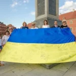 Útoky na Ukrajincov v Poľsku: extrémisti napojení na europoslanca a politikov PiS